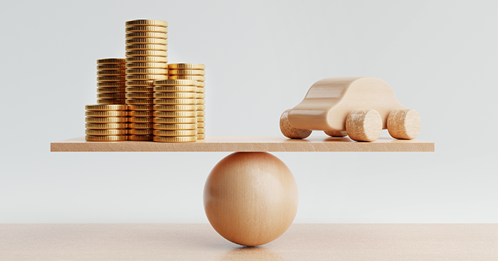 money and car wooden scales