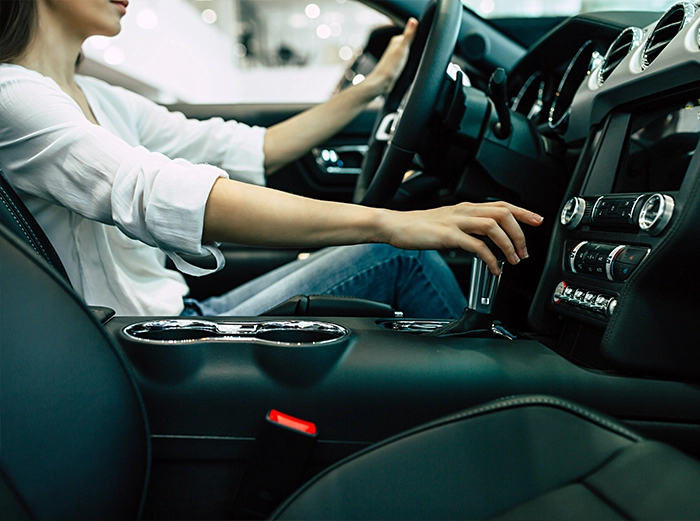 lady in the car driving car interior